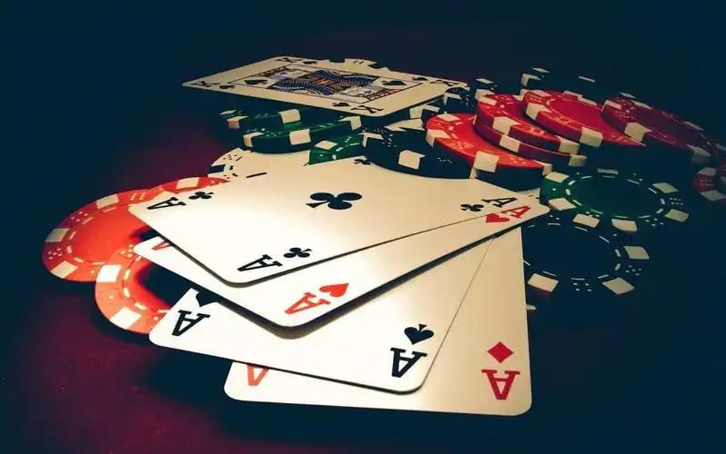 wins77 mobile app interface showing sports betting markets on Liga 1 and live-dealer games
